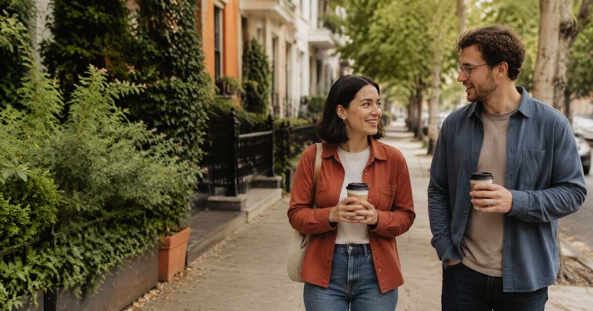 A couple meeting for a relaxed first date in a bright public cafe